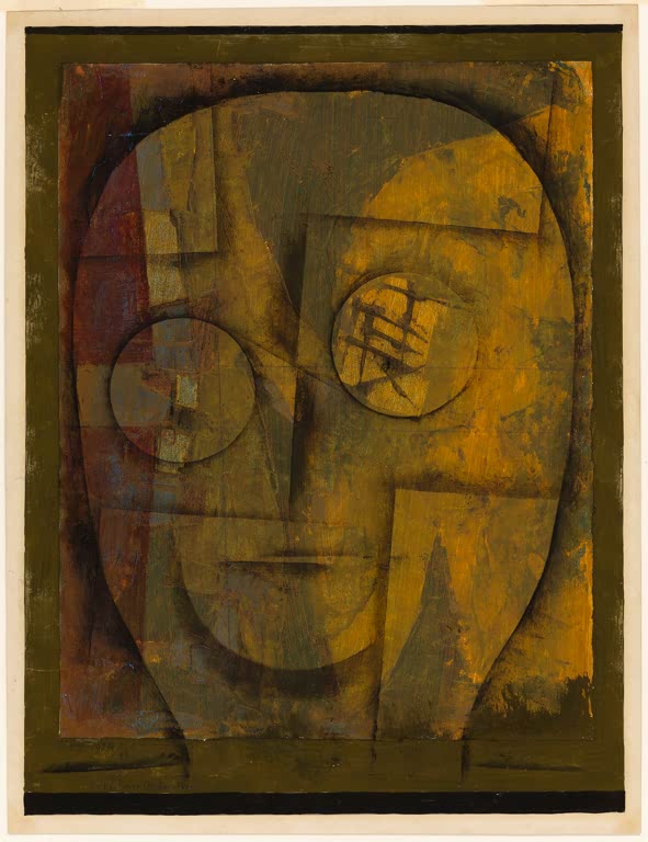 Maskenhafter Kopf mit zwei Kreisaugen in Ocker- und Olivtönen – Paul Klee Kopf (als wäre es ein Portrait) Kunstkopie
