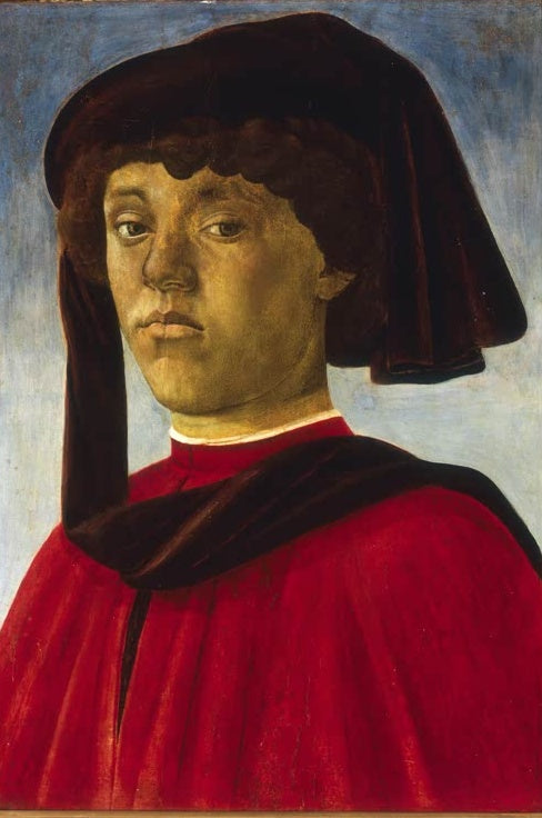 Junger Mann mit dunkler Kappe und rotem Gewand vor blauem Grund – Sandro Botticelli Porträt eines jungen Mannes Kunstkopie